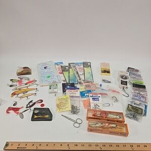 Lot of fishing lures and tackle, as well as hooks and sinkers And More